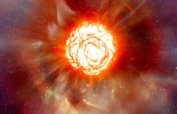 Billowing orange ball of fire exploding in brilliant white, surrounded by gas and dust streaming outward.