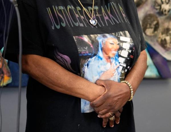 Nadine Young, mother of Ta'Kiya Young, wears a t-shirt memorializing her granddaughter during a press conference at the office of attorney Sean Walton following the indictment of Blendon Twp. officer Connor Grubb.