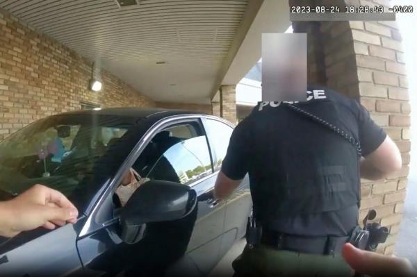 This still image from bodycam video released by the Blendon Township Police on Friday, Sept. 1, 2023, shows a bullet hole in the windshield of a car with Ta'Kiya Young inside after she was shot by a police officer outside a grocery store in Blendon Township, Ohio, a suburb of Columbus, on Aug. 24.